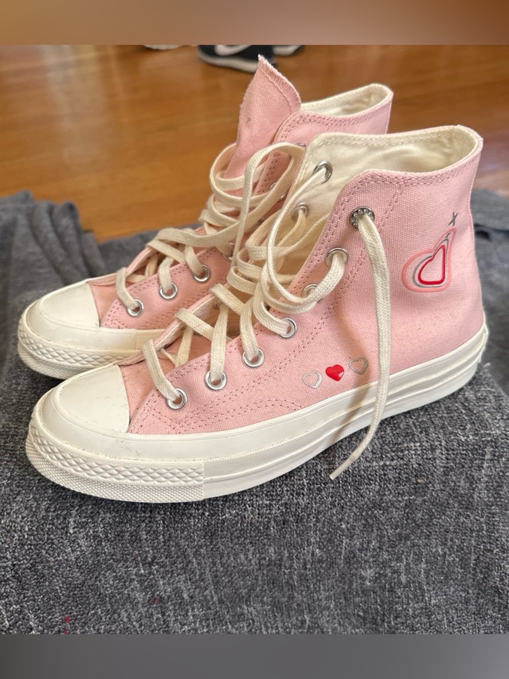 Pink heart Coverse High Tops